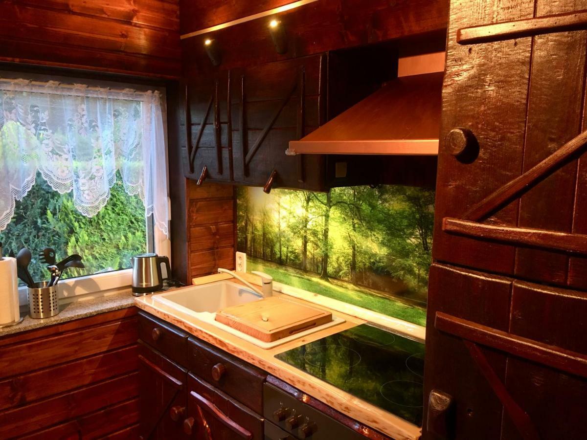 Holzhaus Trollbluemchen Am Wald Und See นอยรุพพิน ภายนอก รูปภาพ